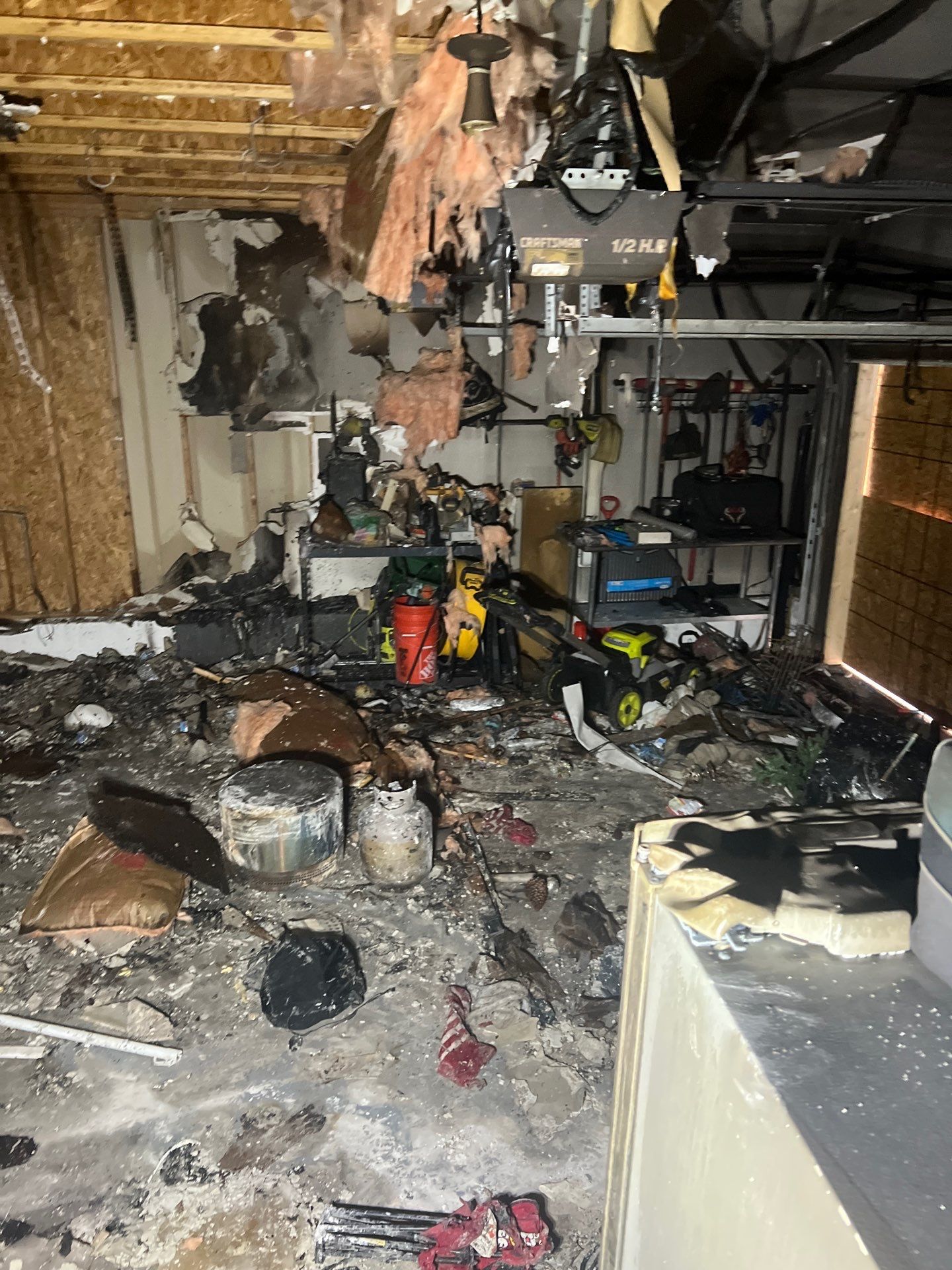 Extensive fire damage inside a Las Vegas garage cleared by IRS crew